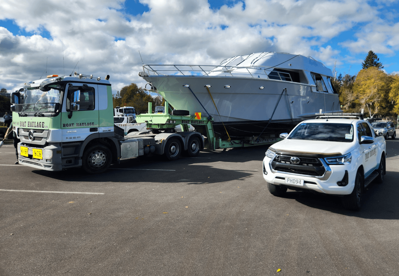boat haulage moving a large boat with pilot ute vehicle NZ